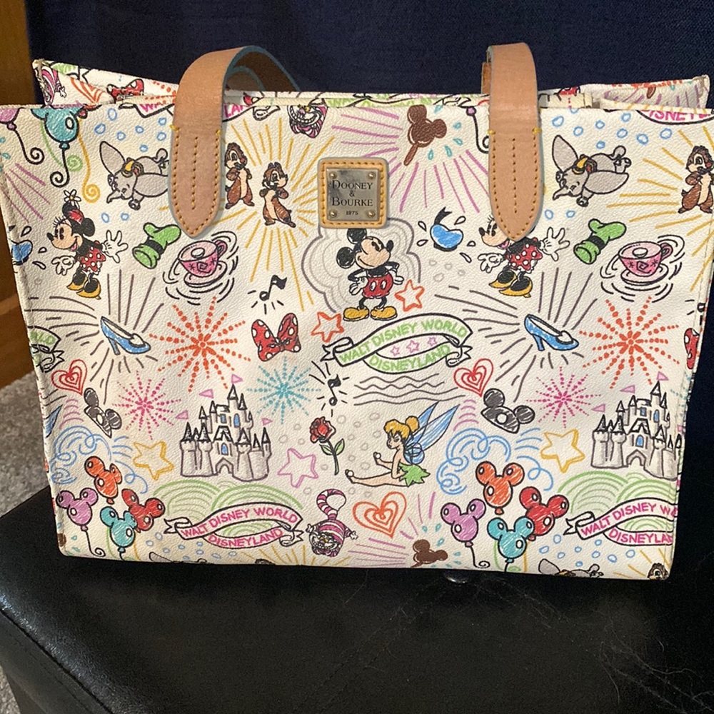 Gently used Disney Dooney and Bourke Sketch Tote. Outside in GORGEOUS condition!